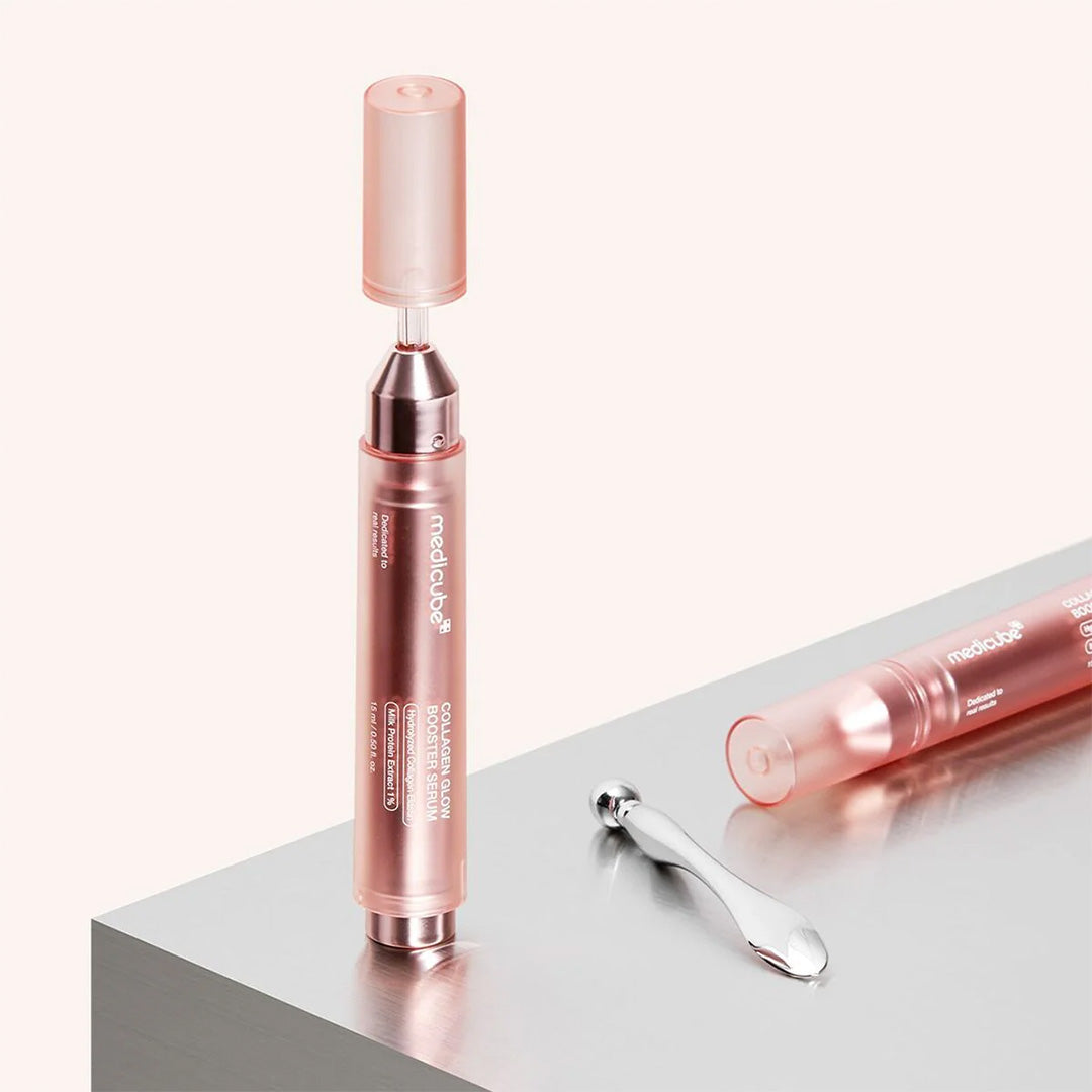 Medicube collagen Glow Booster Milk Serums on a silver surface