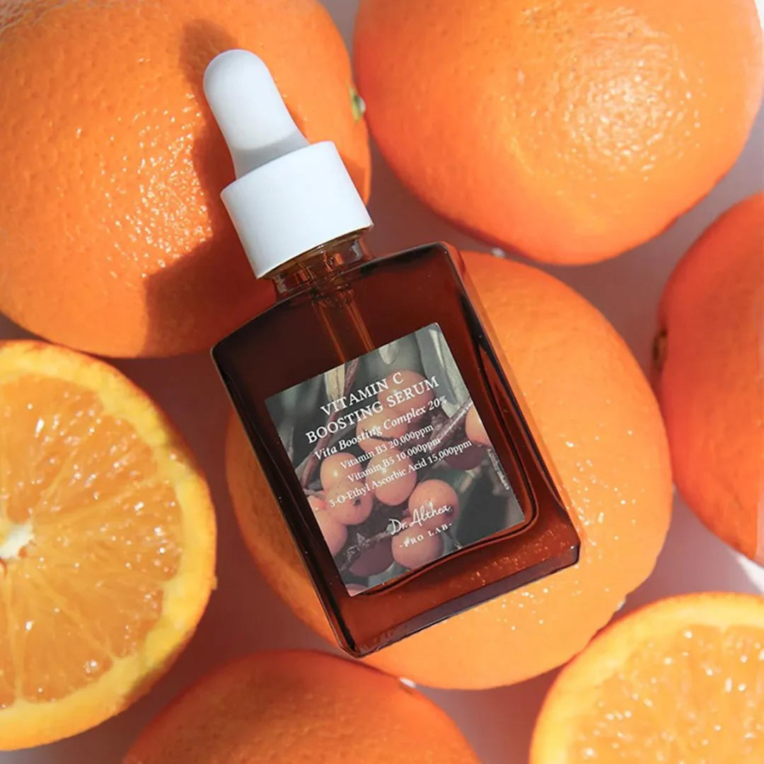 Dr. Althea Vitamin C Boosting Serum with oranges in the background