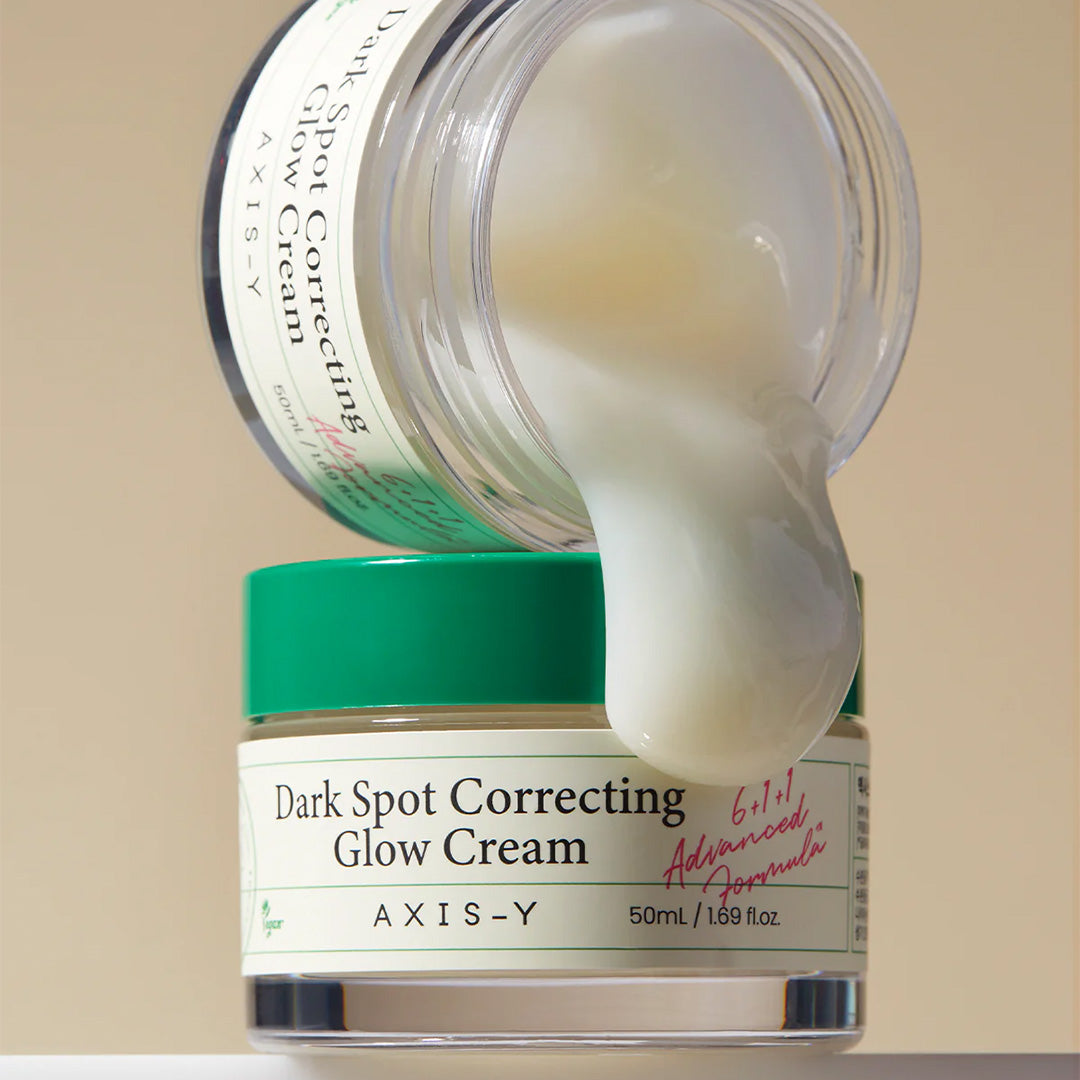 AXIS-Y Dark Spot Correcting Glow Cream jars with product oozing out