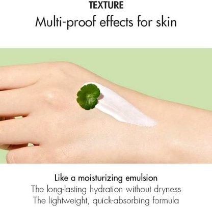 hand with Dr.Ceuracle Cica Regen Waterproof Sun product swatch and a leaf