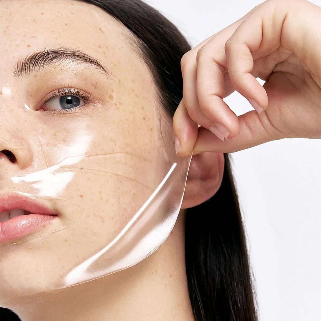 close-up of a woman applying BIODANCE Bio-Collagen Real Deep Mask 