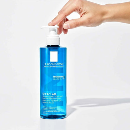 hand touching LA ROCHE-POSAY Effaclar Acne Foaming Cleansing Gel 