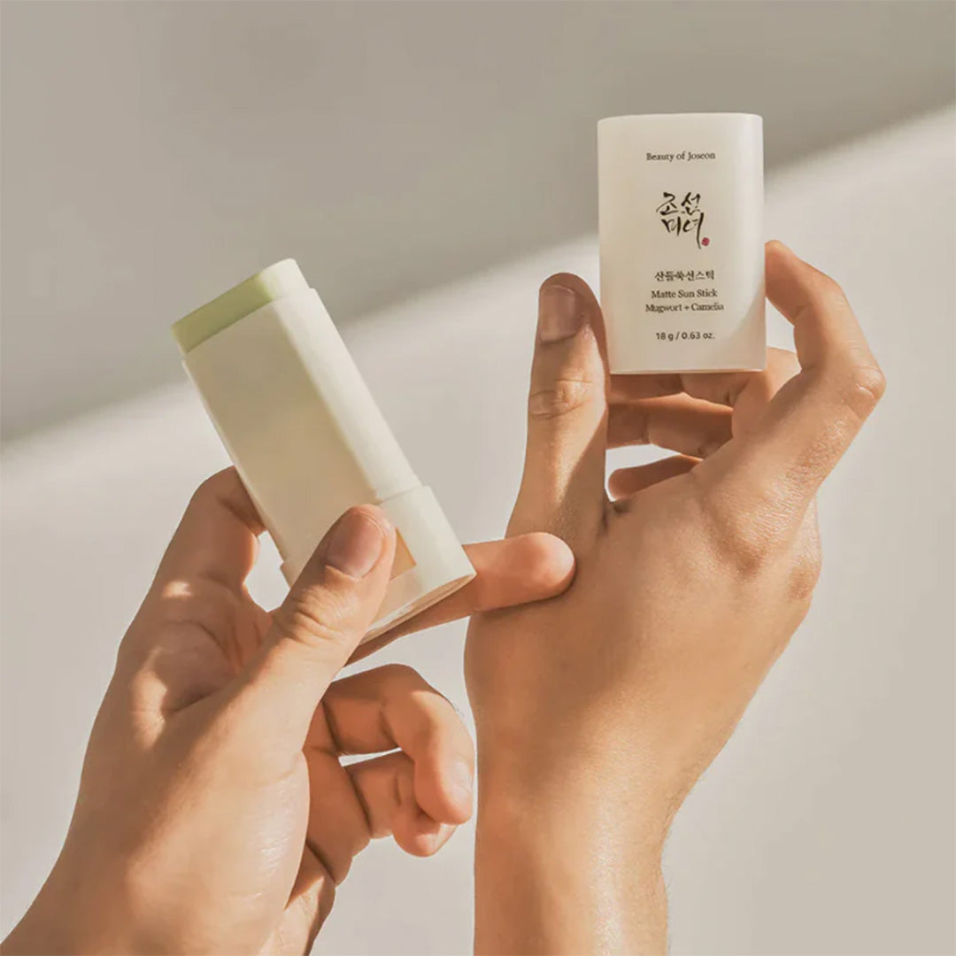 hands holding Beauty of Joseon Matte Sun Stick  