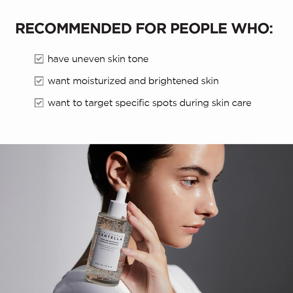 woman holding SKIN1004 Madagascar Centella Tone Brightening Capsule Ampoule