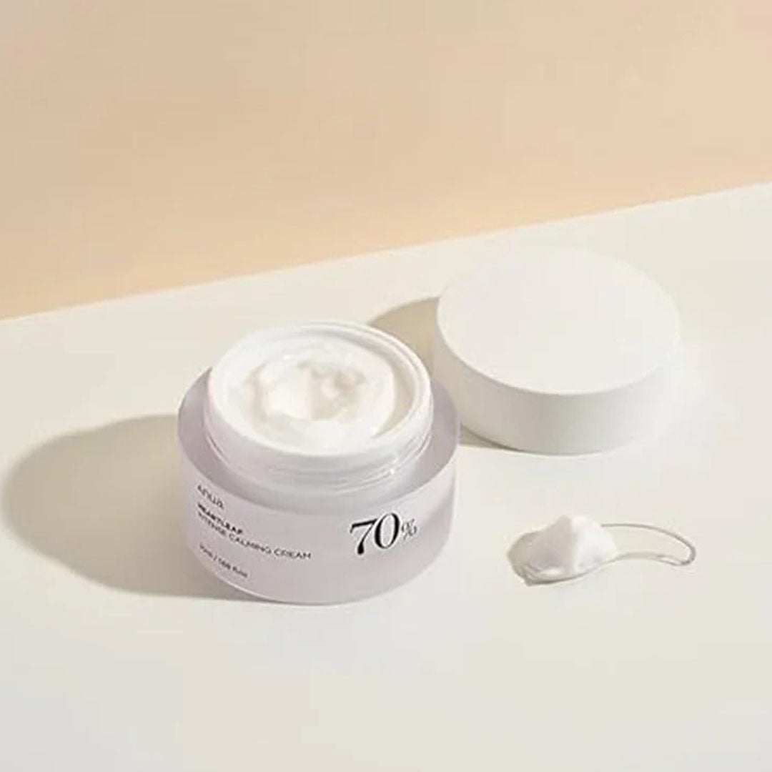open jar of Anua Heartleaf 70 Intense Calming Cream with applicator