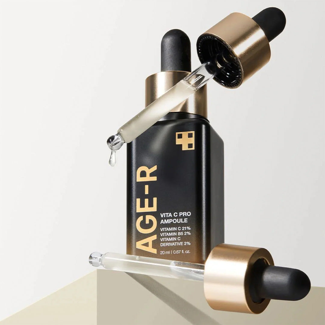 Medicube AGE-R Vita C Pro Ampoule bottle with two applicators