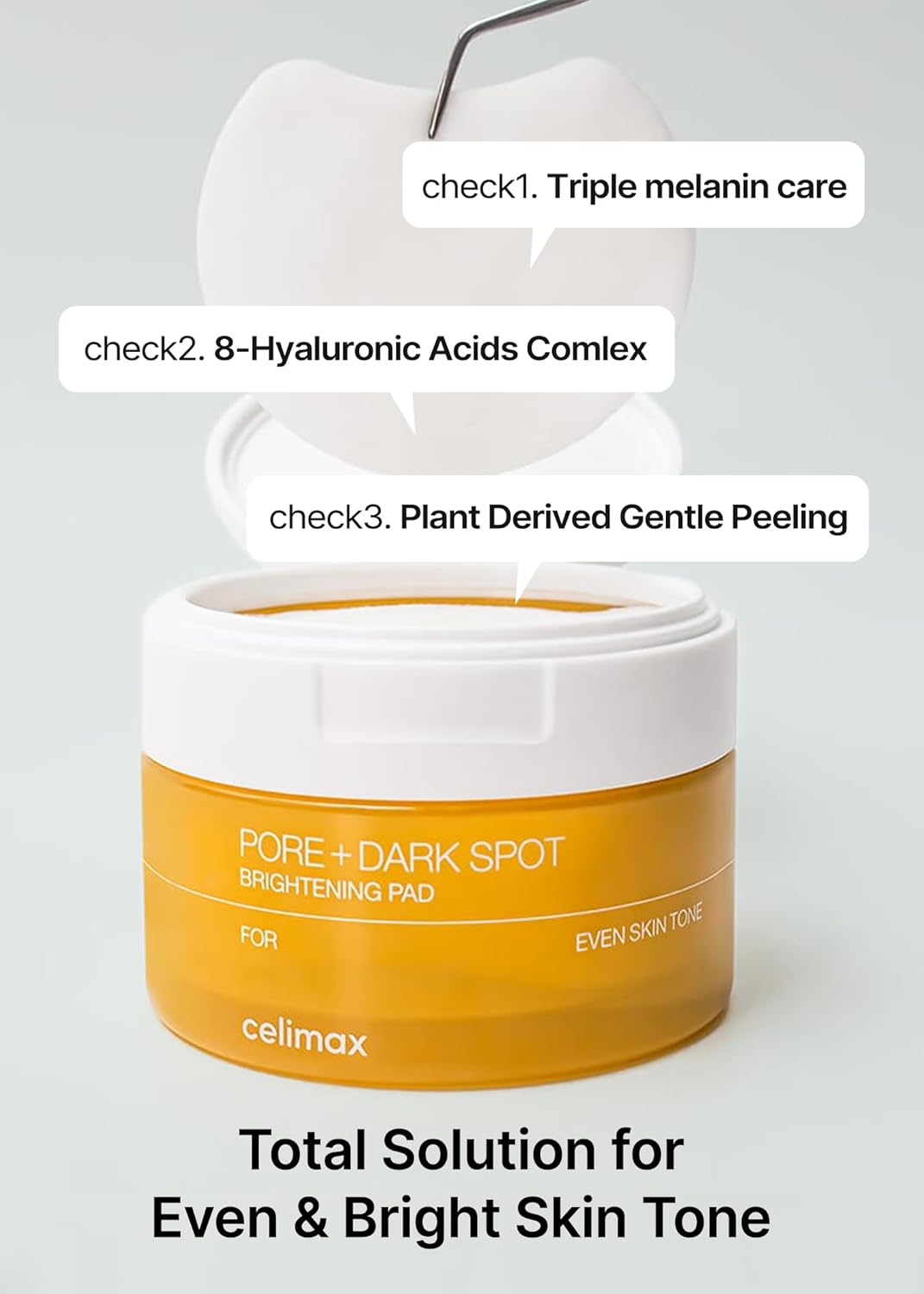 celimax Pore+Dark Spot Brightening Pad taking out of container