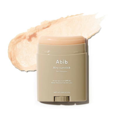 Abib Airy Sunstick Smoothing Bar with product swatch in the background