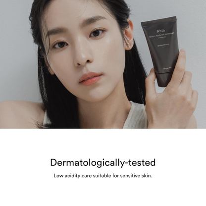 woman holding Abib Sedum Hyaluron Sunscreen Protection Tube
