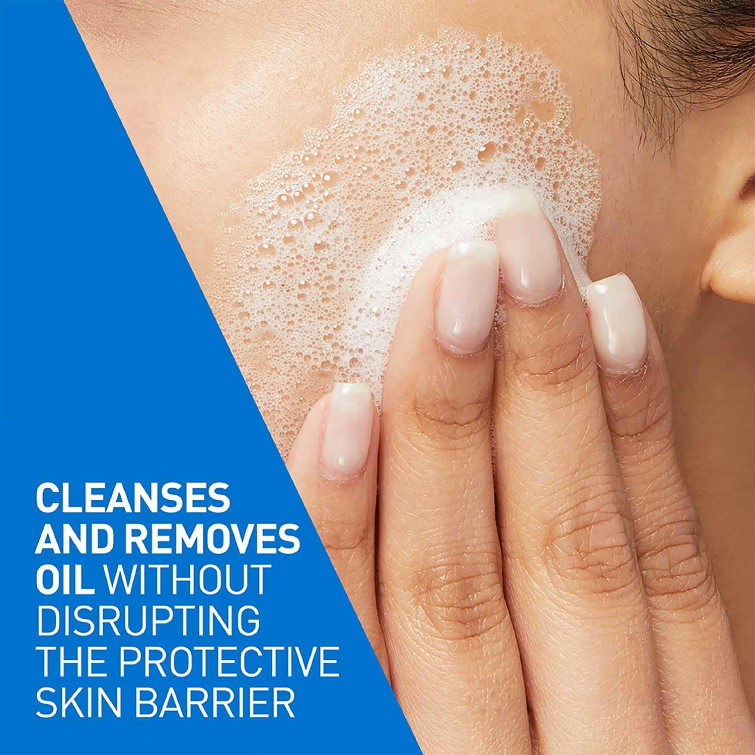 hand applying CeraVe Foaming Cleanser for Normal to Oily Skin on cheek