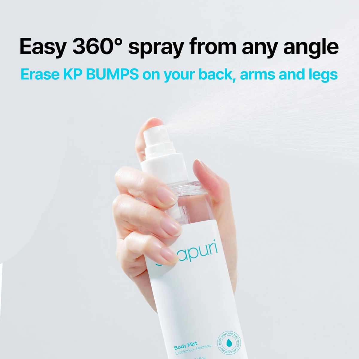 hand holding Seapuri Body Mist bottle