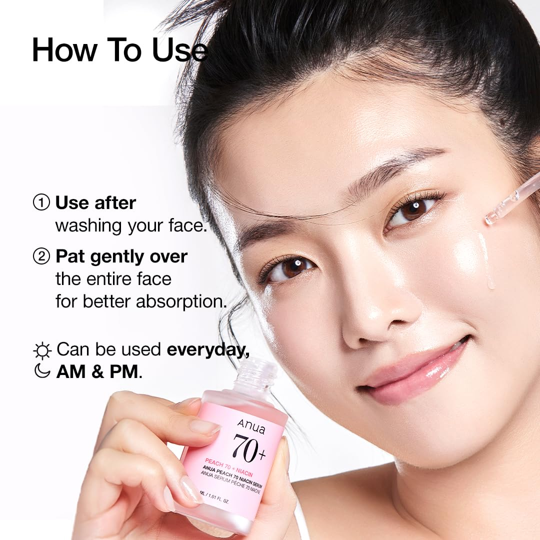 woman applying Anua Peach 70+ Niacin Serum on her face