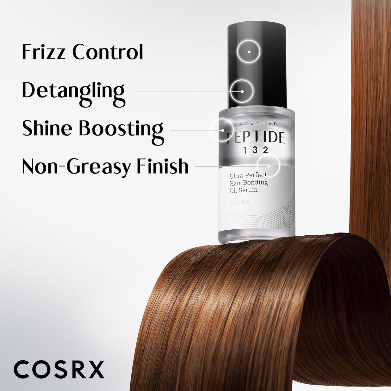 COSRX PEPTIDE 132 Hair Bonding Oil Serum bottle on silky hair