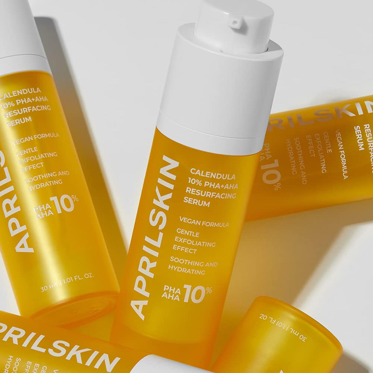 multiple bottles of APRILSKIN Calendula 10% PHA+AHA Resurfacing Serum