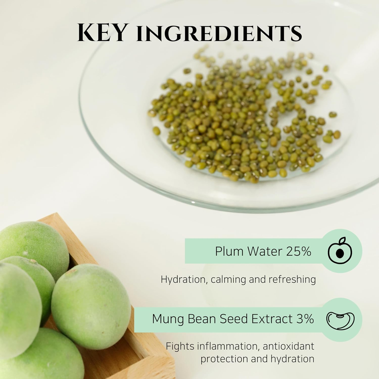 mung beans in a plate beside a group of plums