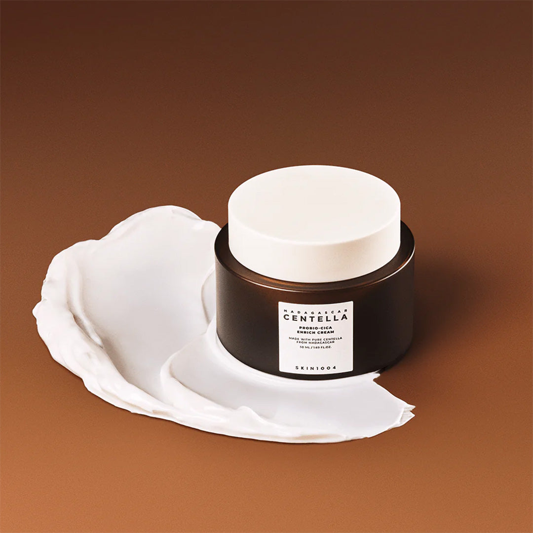 SKIN1004 Madagascar Centella Probio-Cica Enrich Cream jar with product swatch