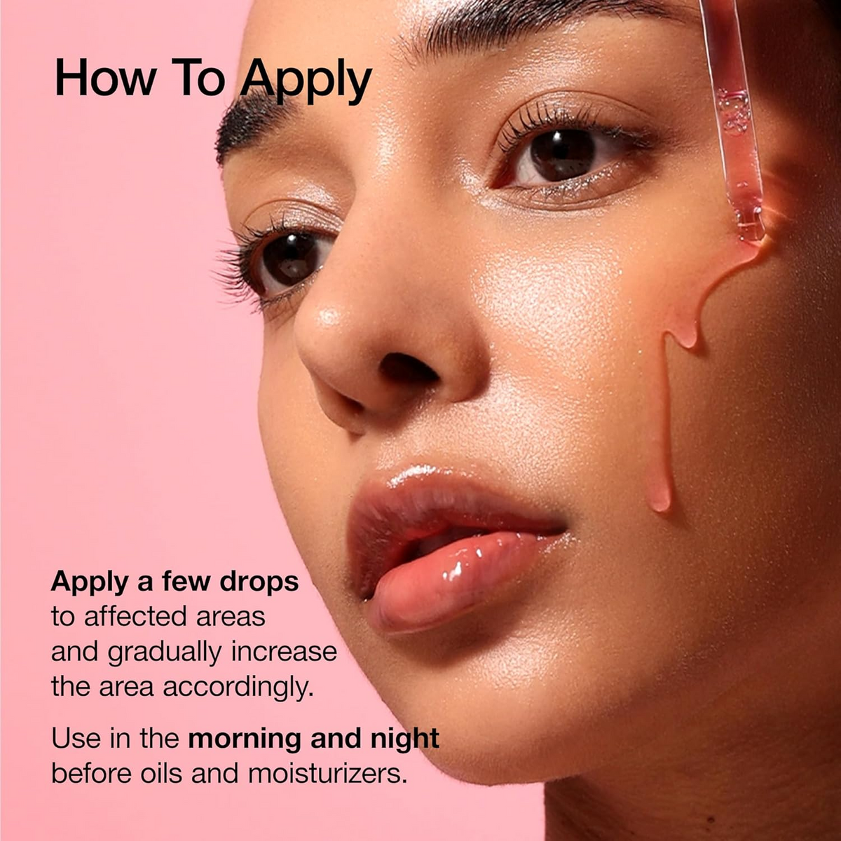woman applying Anua Niacinamide Serum on her face