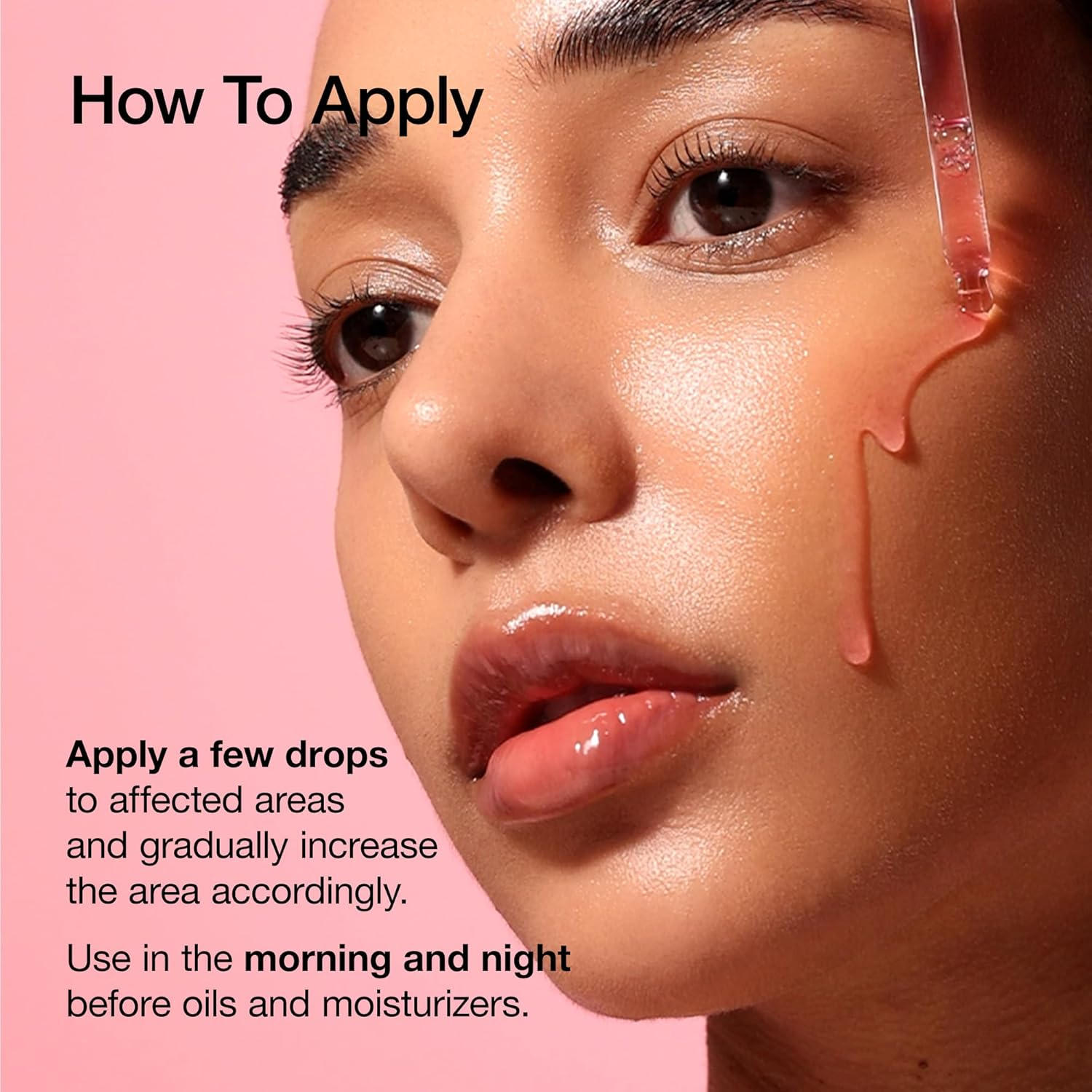 woman applying Anua Niacinamide Serum on her face