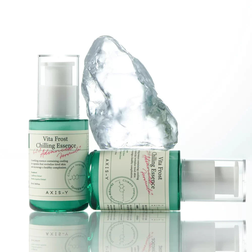 Axis-Y Vita Frost Chilling Essence bottles with piece of ice