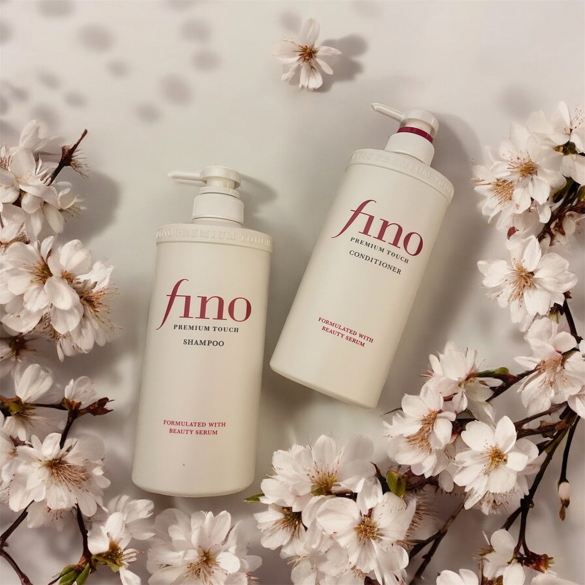 Bottles of Shiseido Fino Premium Touch Shampoo and conditioner