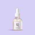 a bottle of Glow Deep Serum: Rice + Alpha-Arbutin