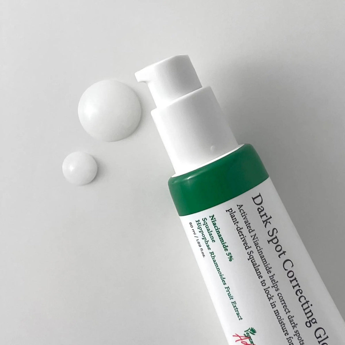 AXIS-Y Dark Spot Correcting Glow Serum with product drops