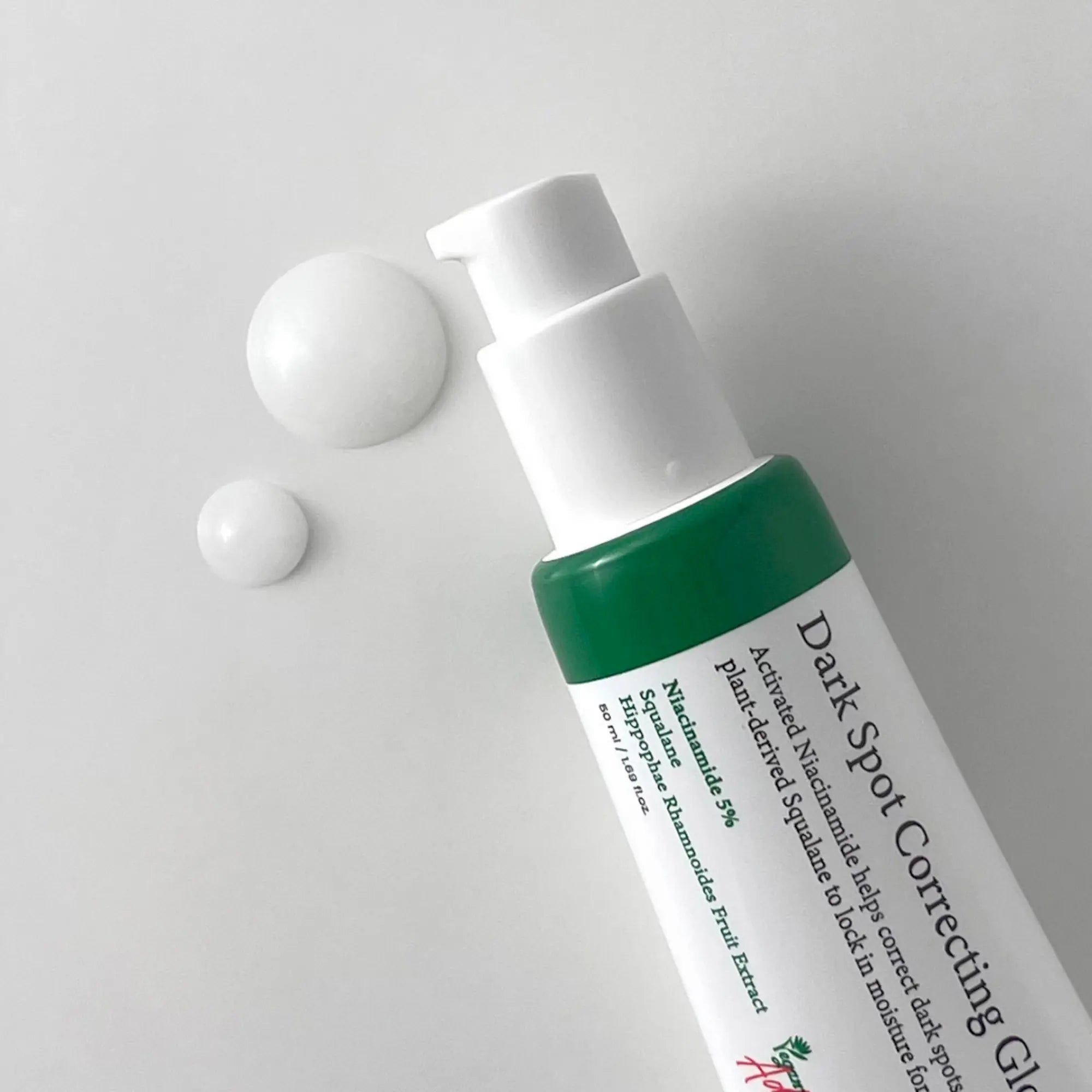 AXIS-Y Dark Spot Correcting Glow Serum with product drops
