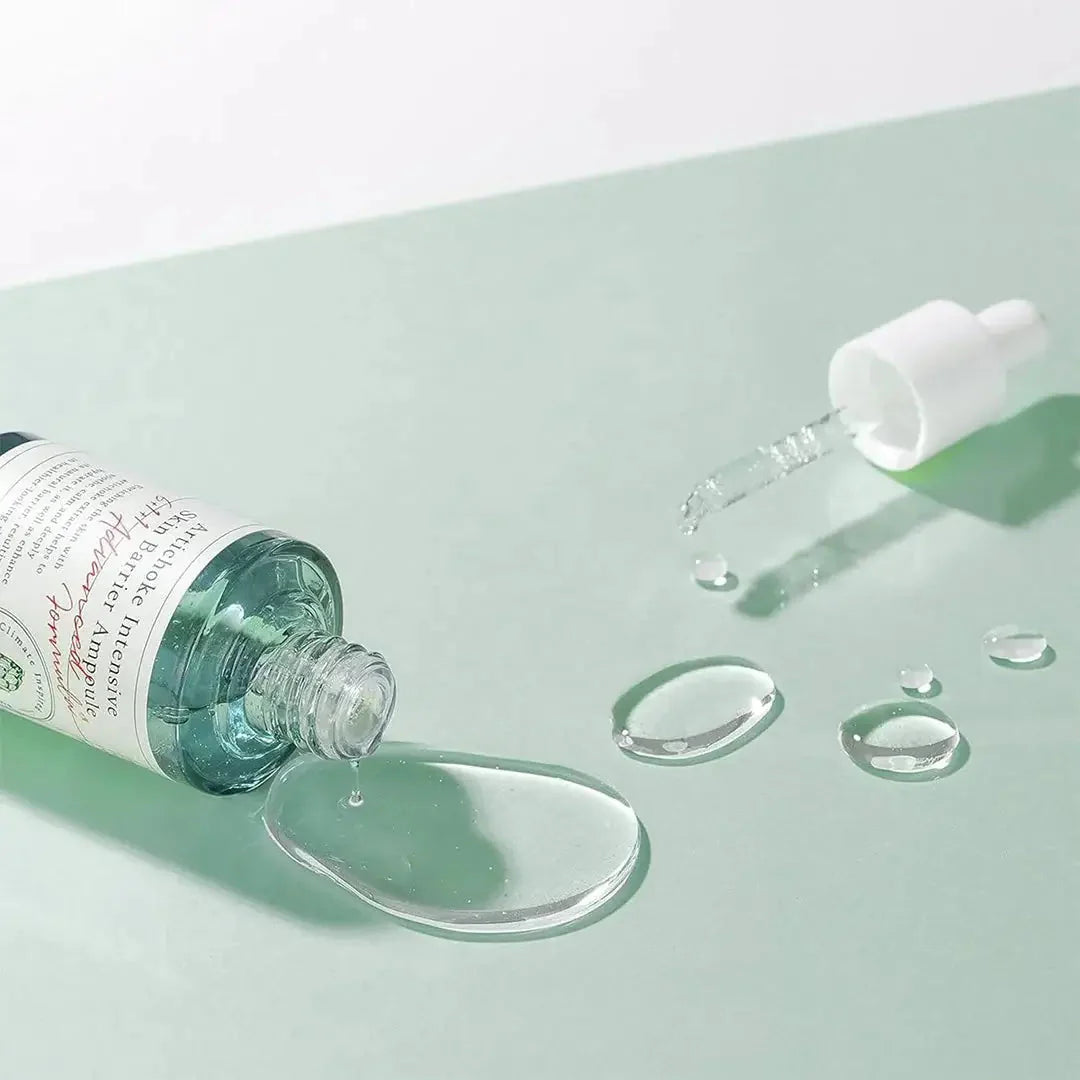 open bottle of AXIS-Y Artichoke Intensive Skin Barrier Ampoule with dropper