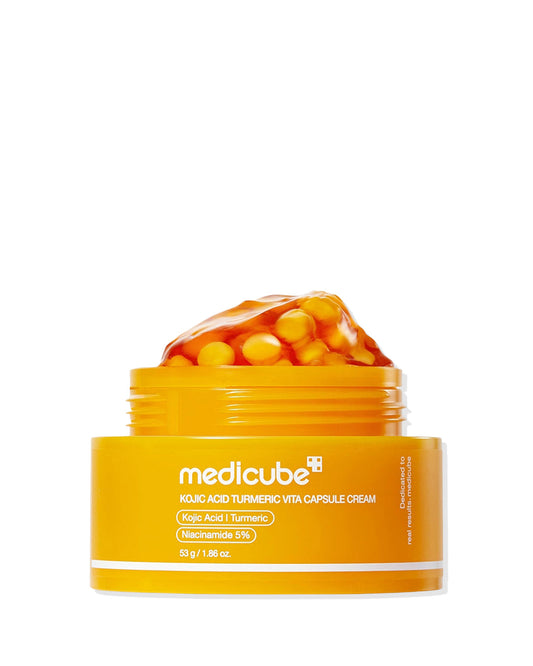 the organce color capsule Is medicube kojic acid turmeric vita capsule cream with niacinamide 5% incuded in the orange cream.