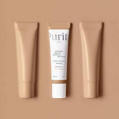 Three BB Cream tubes on a beige background